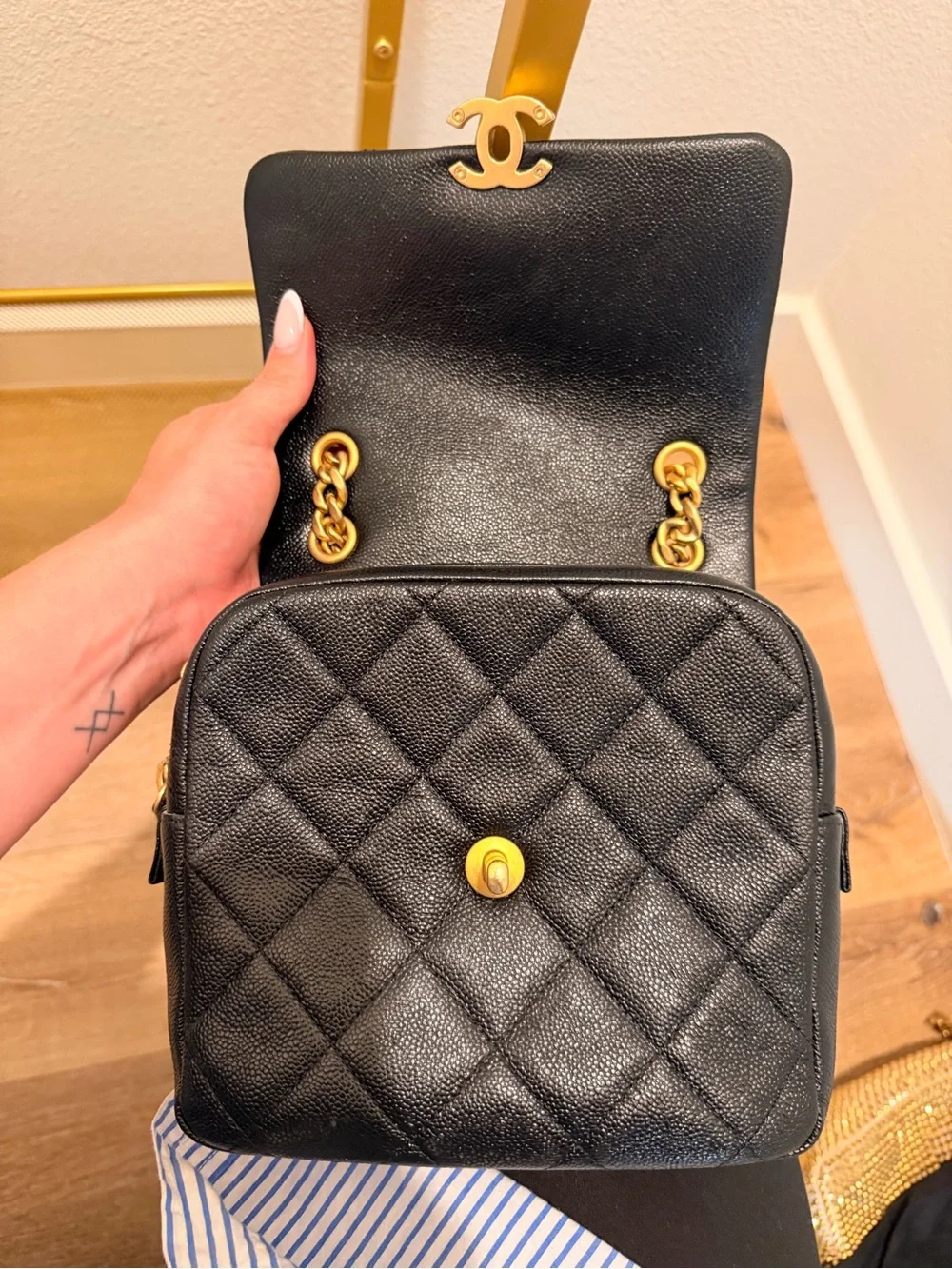 CHANEL Shiny Caviar Quilted Chain Melody Backpack Black